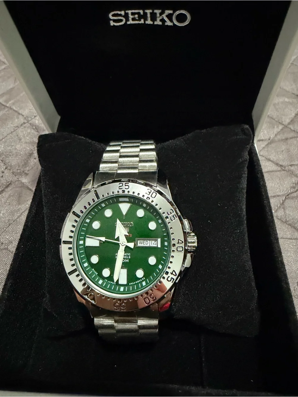 Seiko Stainless Steel Watch with Green Dial and Silver Bezel